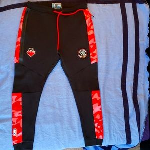 Mens Toronto raptors and Pink Dolphin collab joggers,  size L